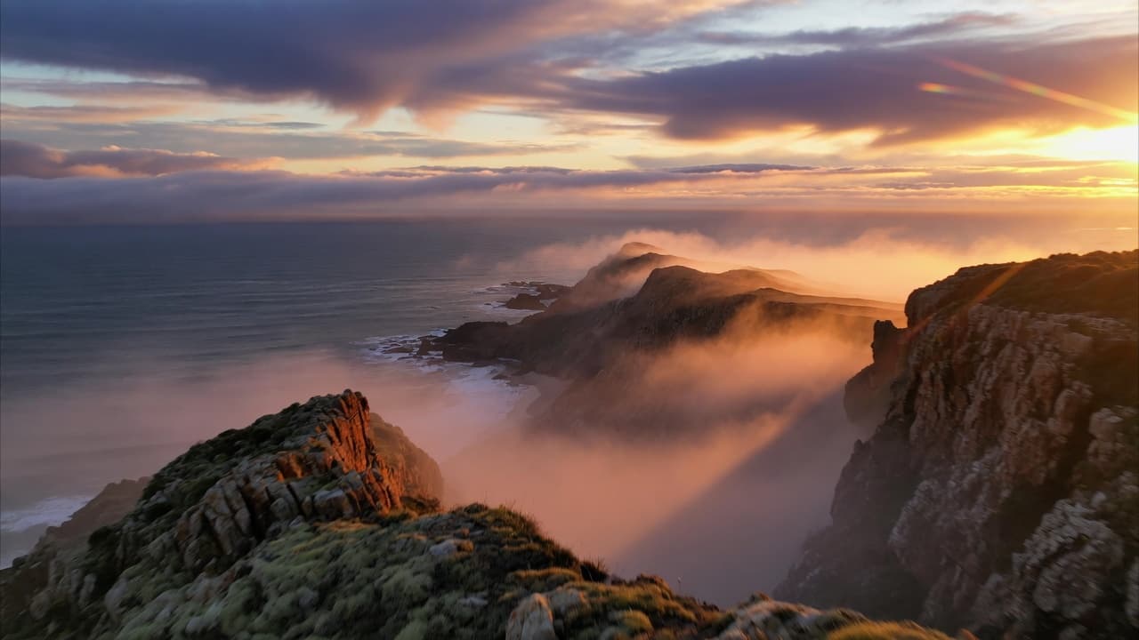 Aerial cliffs at sunrise cinematic video frame